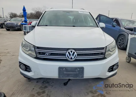 2014 Volkswagen Tiguan S z USA, uszkodzony, nr VIN WVGAV3AX7EW058433